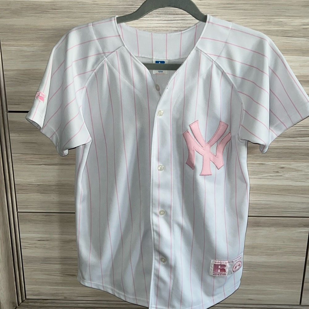 Pink and white New York Yankees jersey. Youth size 12/14